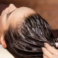 cosmetologist-massaging-hair-head-woman-spa-treatments-beauty-treatment-spa-salon_186202-7428